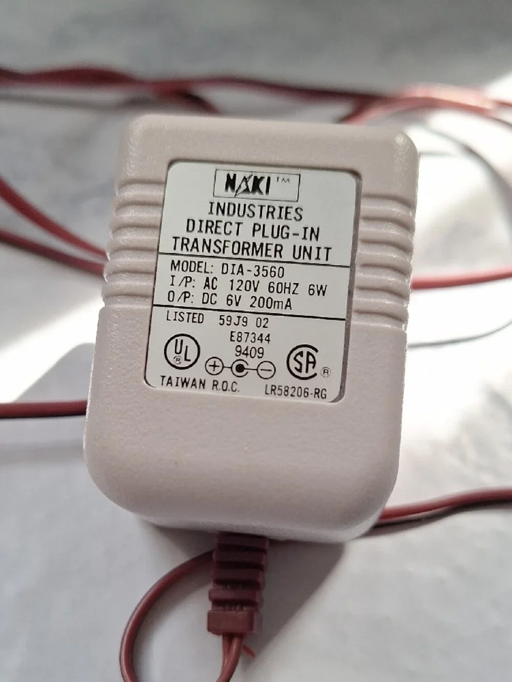 Naxa Beige AC Adapter Charger with Brown Cord